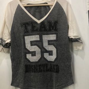 Woman’s DisneyParks M grey baseball vneck top
